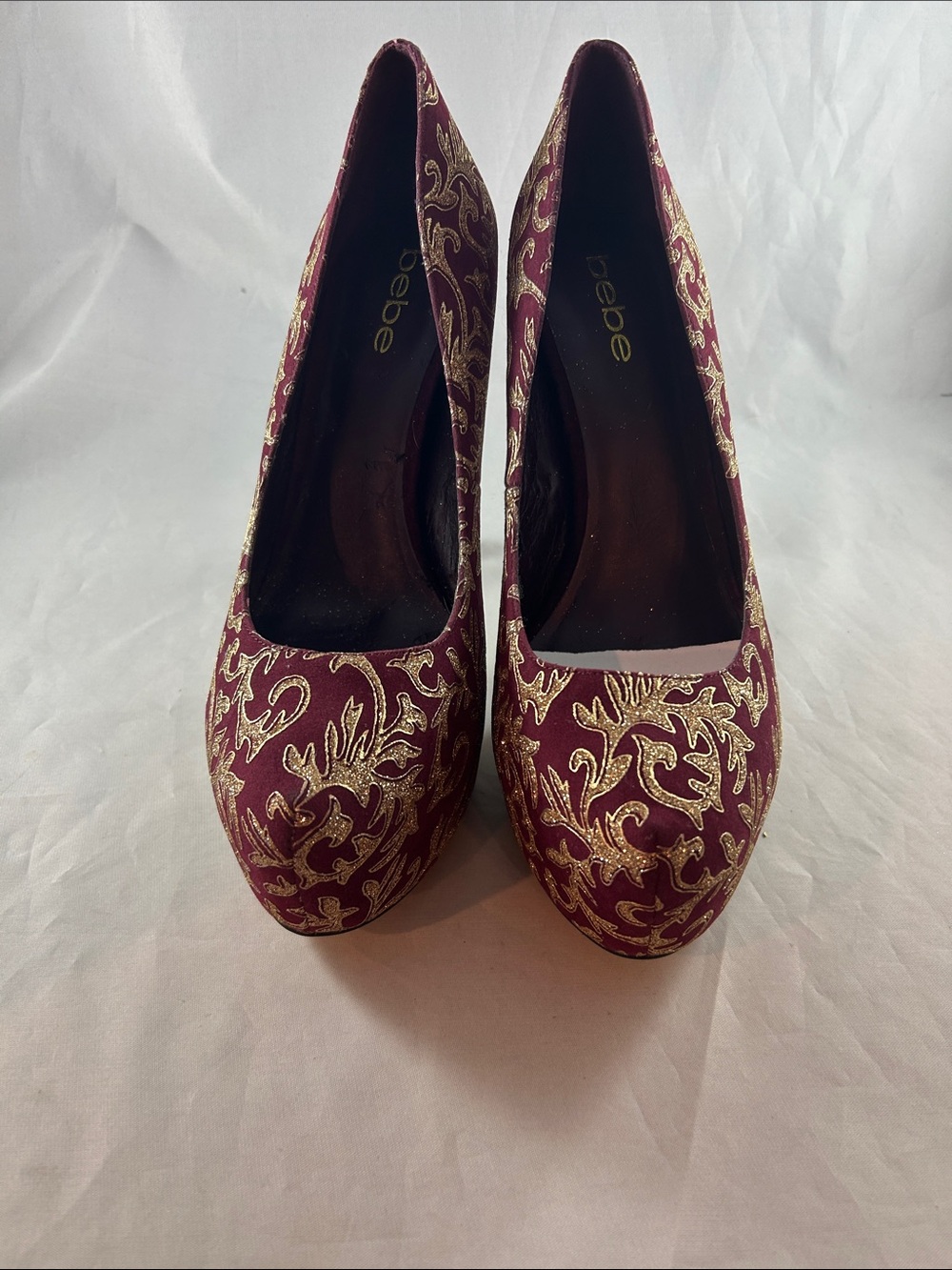 bebe Burgundy Platform Pumps with Gold Embroidered Detail
